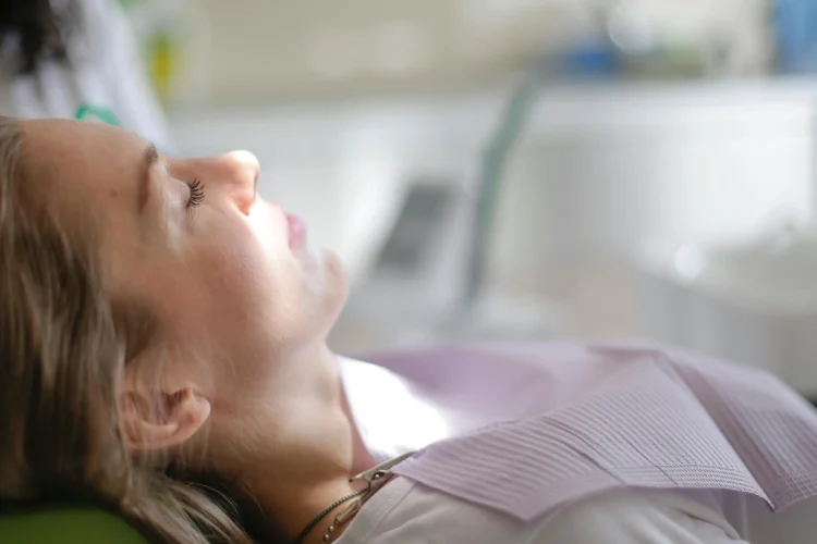 Patient under deep sedation for dental surgery in a dental clinic