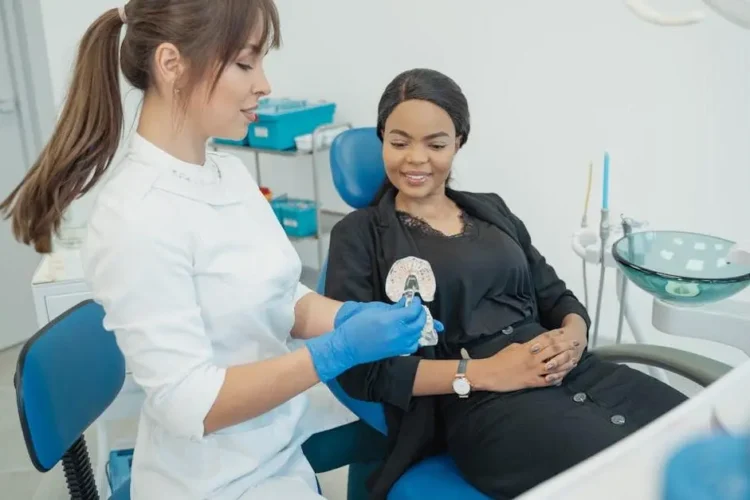 Dentist treating a patient, emergency dentists open late