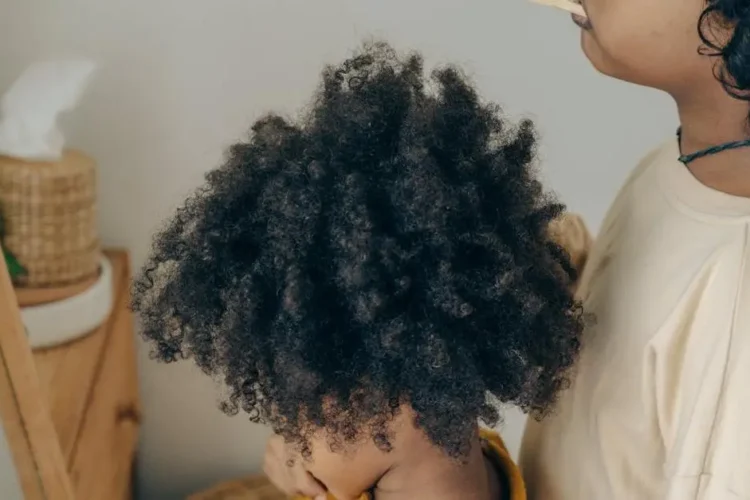 Children brushing teeth together, representing dental anxiety in children.