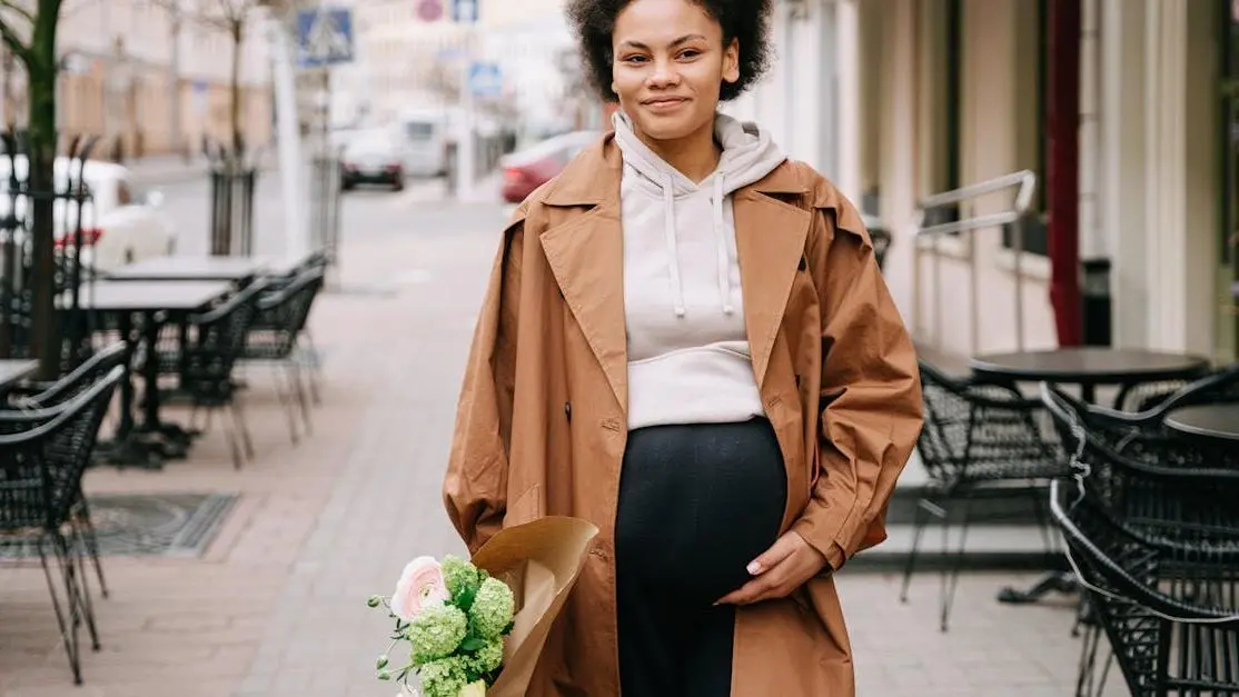 Pregnant woman prioritizing dental care during pregnancy.