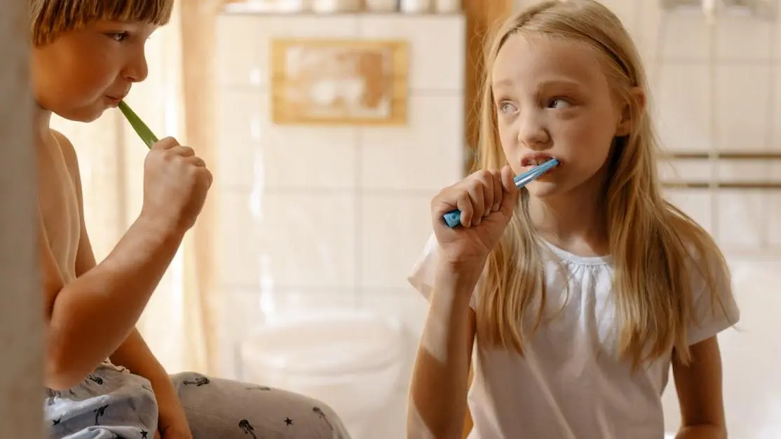 Children practicing oral hygiene to prevent early childhood caries.