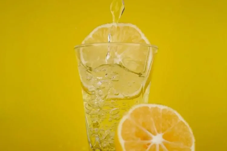 Lemon splash drink highlighting fluoride benefits for adults