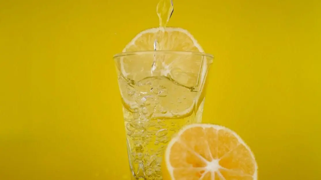 Lemon splash drink highlighting fluoride benefits for adults