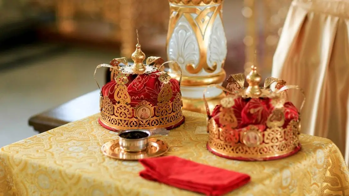 Dental crowns arranged on a table, related to getting a crown or bridge.