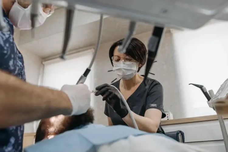 Pregnant woman receiving dental care.