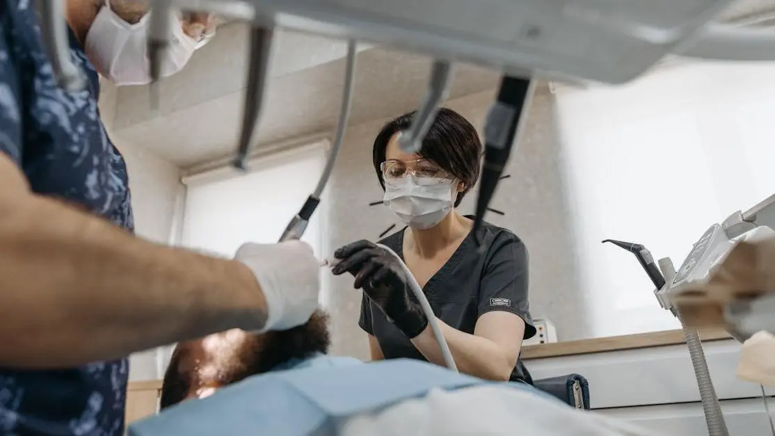 Pregnant woman receiving dental care.