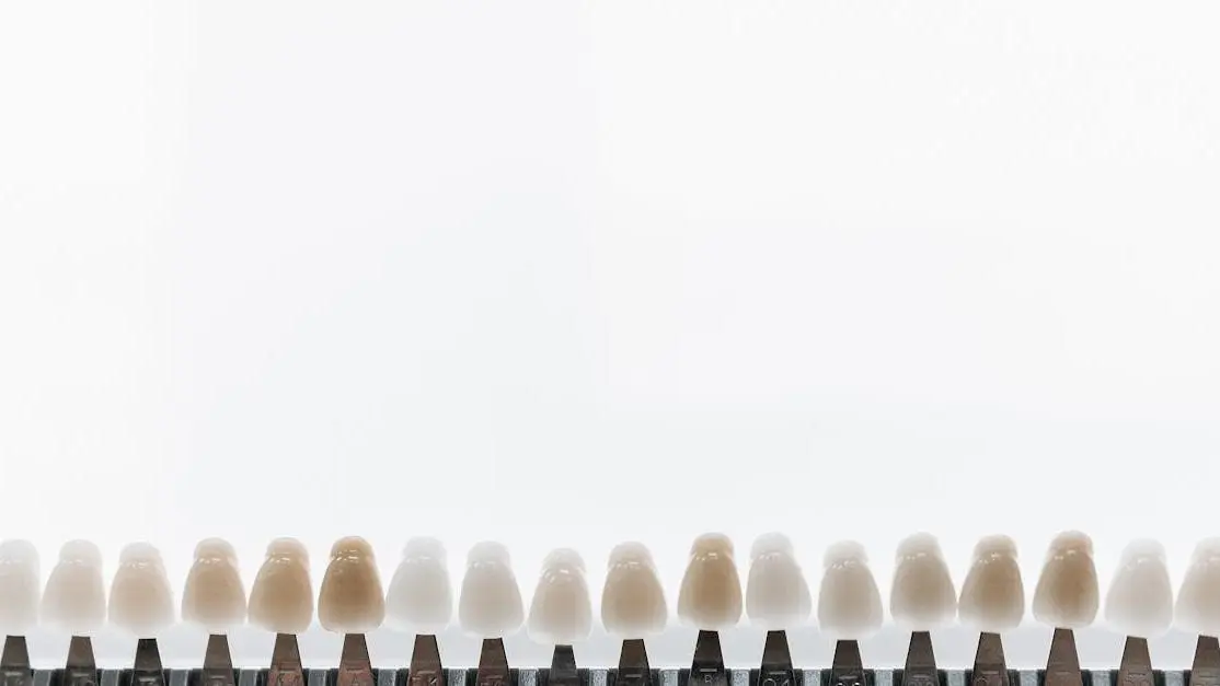 Porcelain veneers enhancing smile against bright background