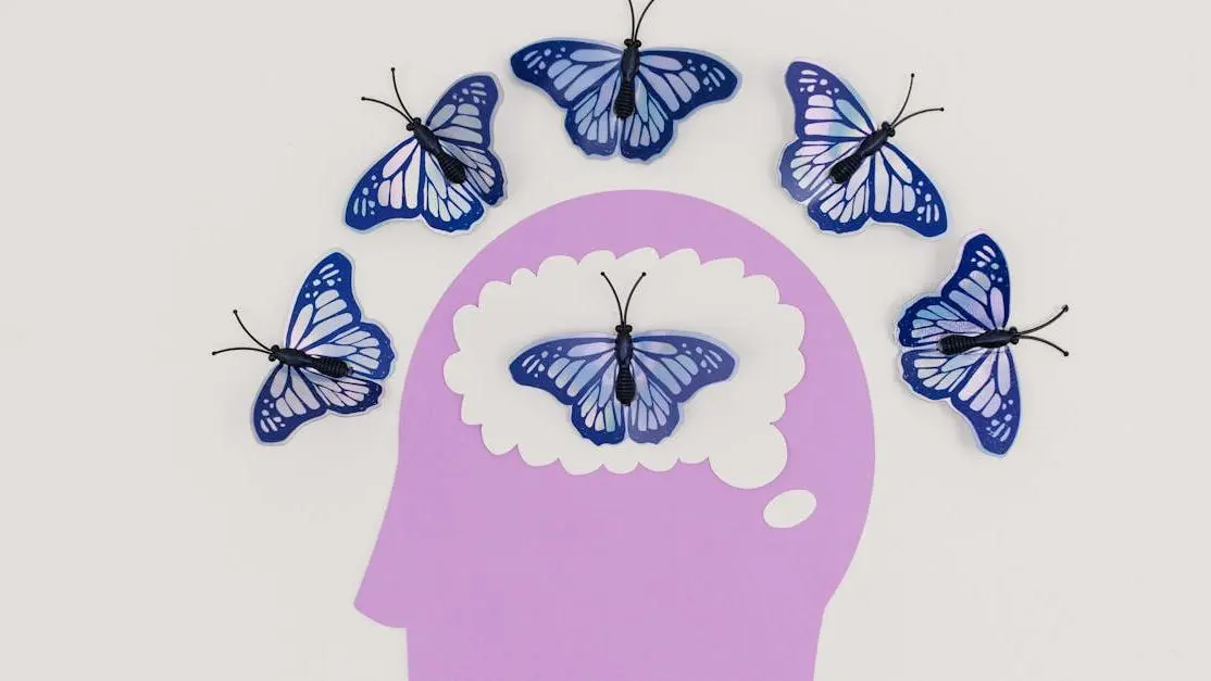 Visual representation of replacing missing teeth concept with butterflies symbolizing transformation