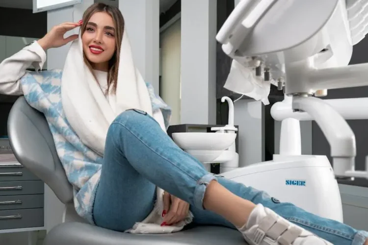 Woman receiving sedation dentistry for comfort in a dental chair