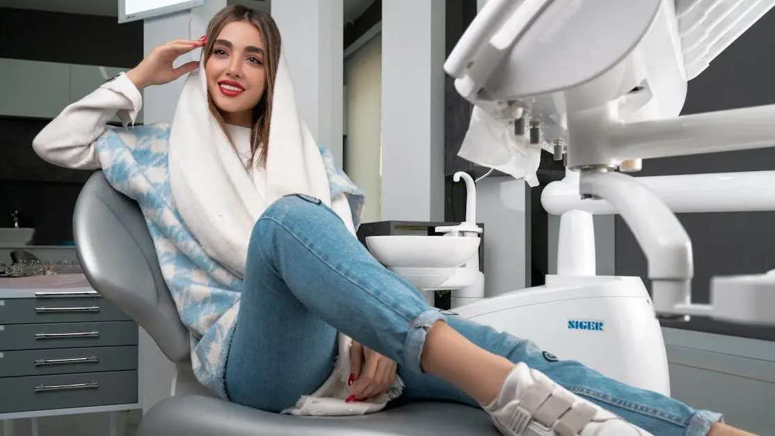 Woman receiving sedation dentistry for comfort in a dental chair