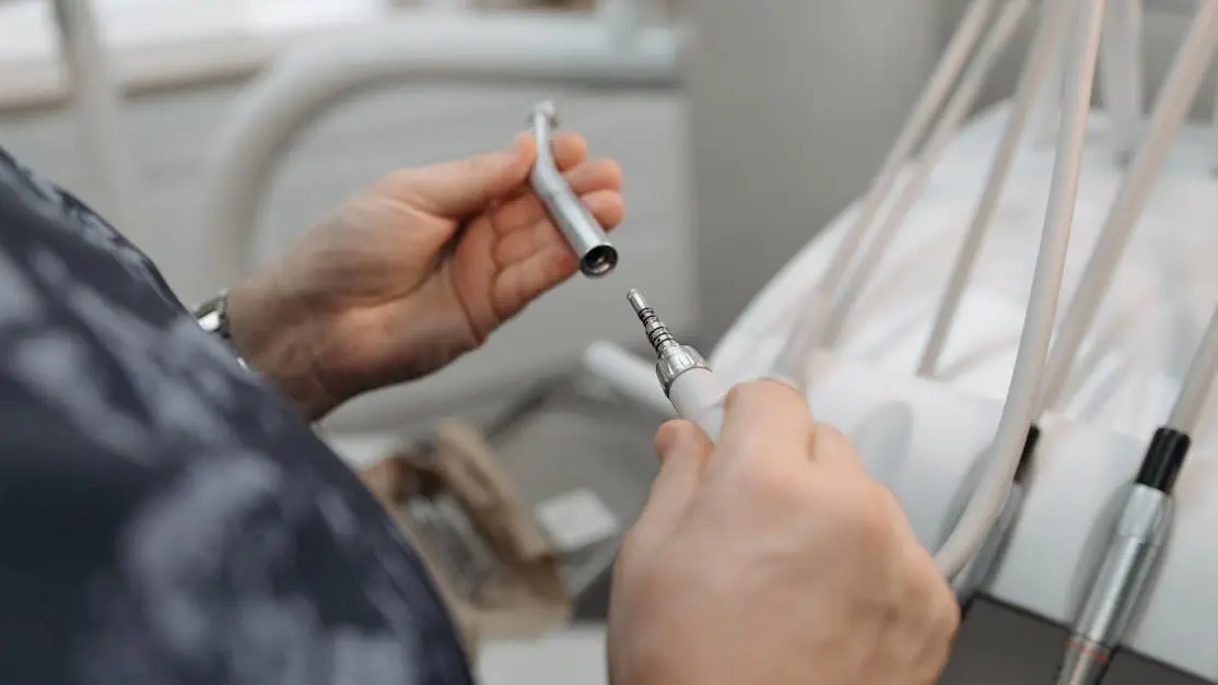 Dentist using a tool for specialty dentistry procedures