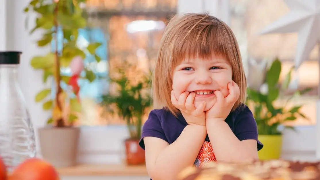 Toddler smiling, showcasing tmj wellness.