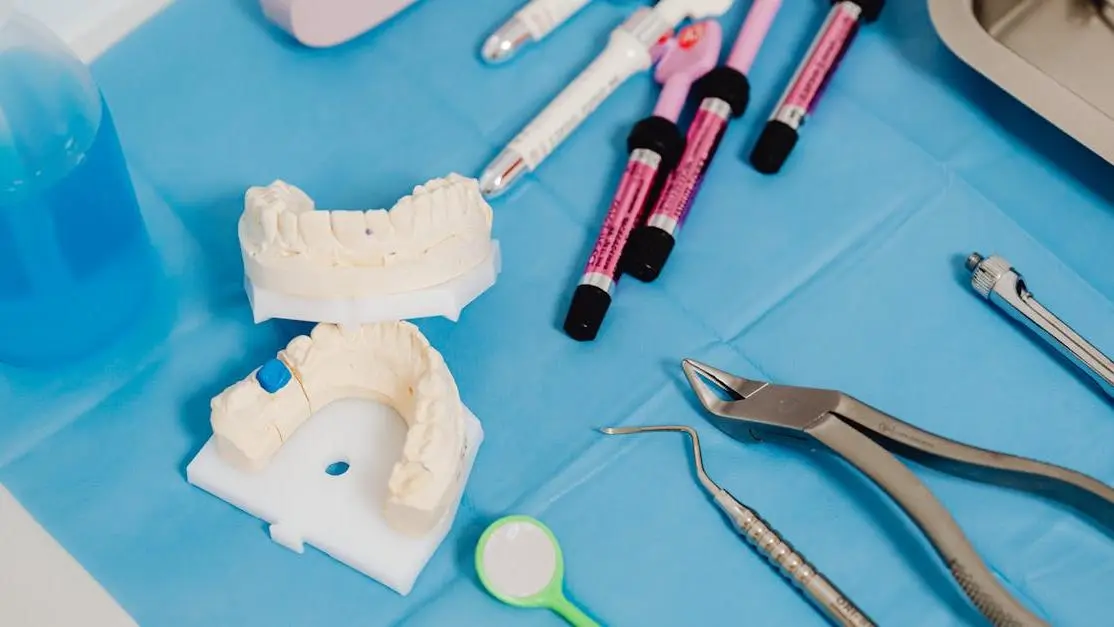 Dental cast and instruments showcasing types of dental implants materials