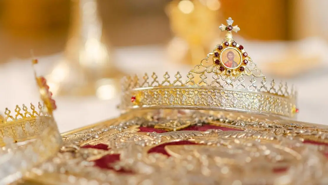 Gold dental crown showing detailed craftsmanship, highlighting material used in "what is a dental crown made of".