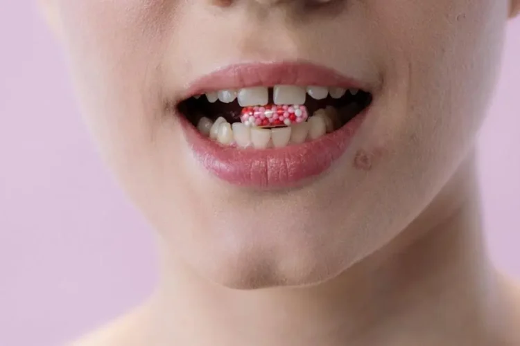 Smiling woman illustrating the benefits of flossing.