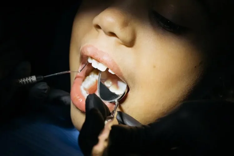 Child at dentist for bleeding gums checkup