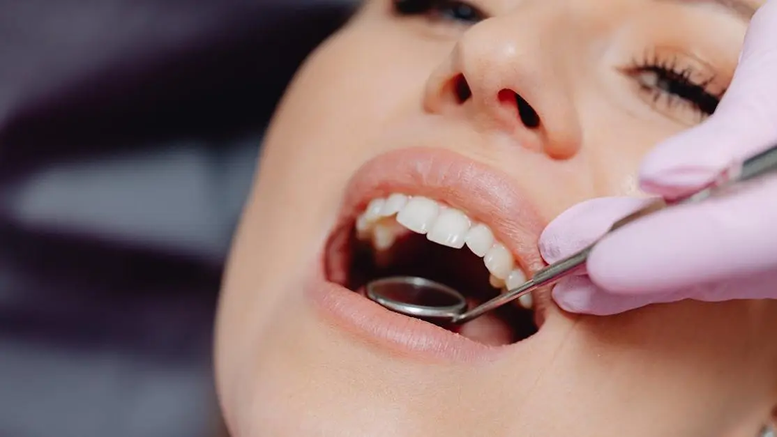 Dental checkup with tools, highlighting chewing gum's impact on dental health.