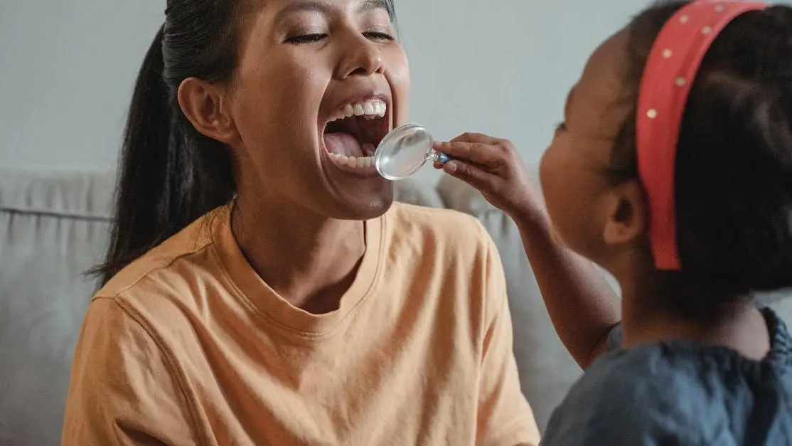 Mother and daughter exploring dental health, relating to common dental questions.