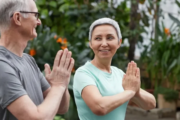 Happy couple showcasing results of gum disease treatment.