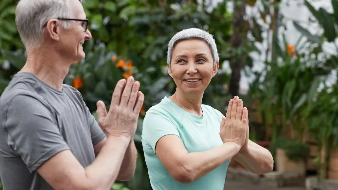 Happy couple showcasing results of gum disease treatment.