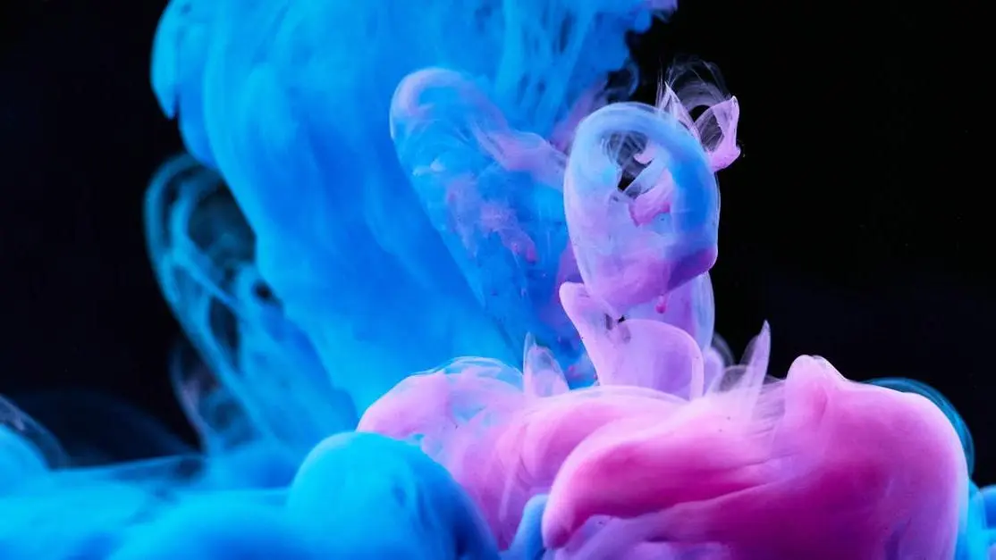 Colorful mouthwash diffusion in water captured in high-speed photography